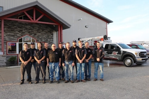 A Look at Getting RV Repairs at Mast Service Center in Gretna IN image of the whole Mast Service Center team pictured in front of shop