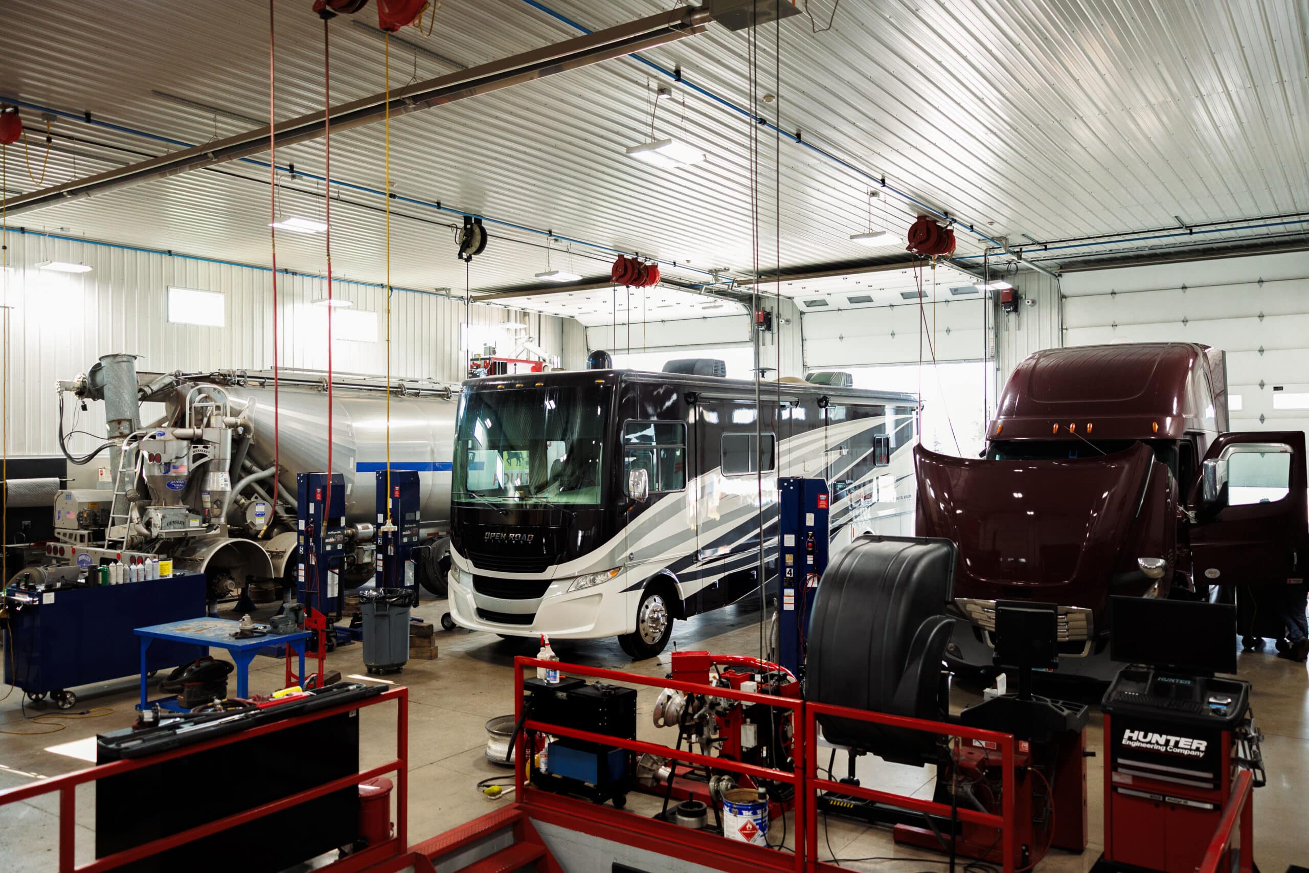 RV Alignments Service at Mast Service Center in Etna Green, IL. image of Berea RV on Hunter ForceMatch heavy duty alignment machine in shop bay